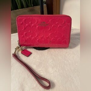 Coach Fuchsia Embossed Wristlet